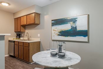 Kitchen with painting on wall